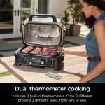باربیکیو و اسموکر هوشمند نینجا مدل Woodfire Pro Connect XL OG951 | گریل 7 کاره بلوتوثی و ایر فرایر فضای باز {استوک} - Image 8
